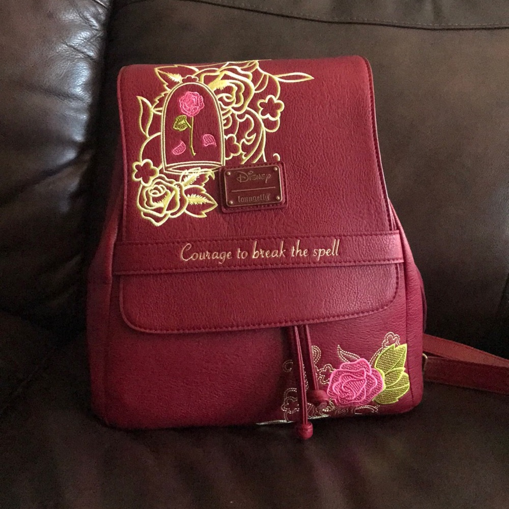 Loungefly beauty and the beast red backpack